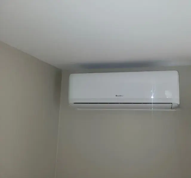 Air conditioning unit installed on a wall