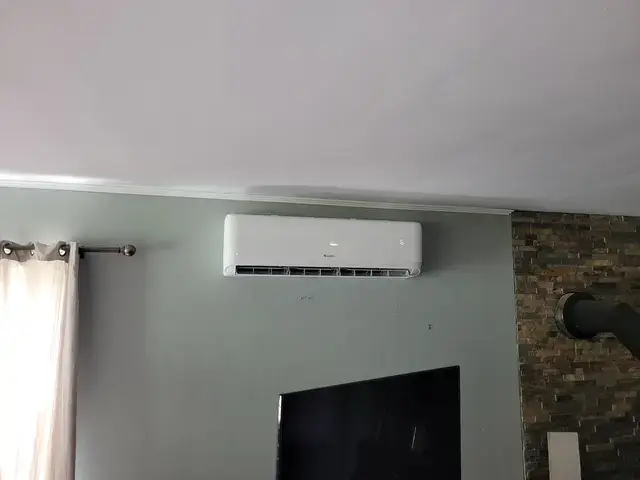 Air conditioning unit with a sleek design mounted on a wall