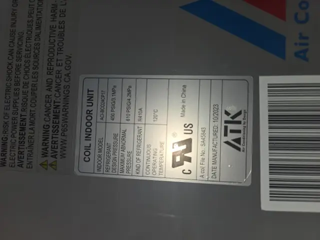 A label with text and barcodes detailing specifications of an indoor coil unit