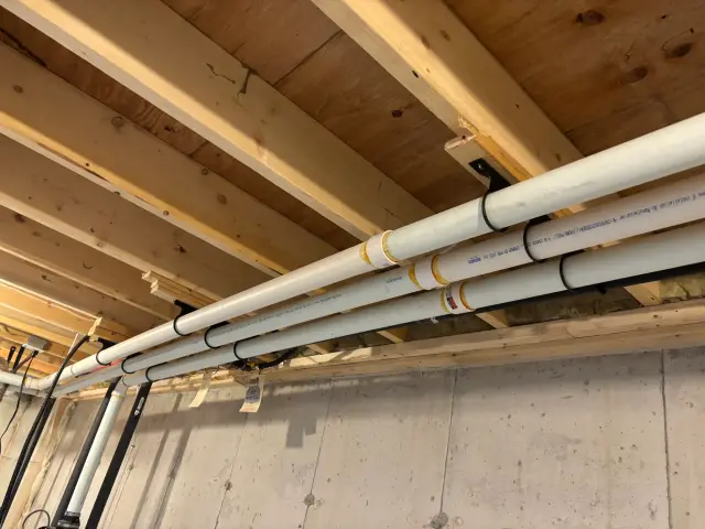 Radiant floor heat tubing laid on insulation