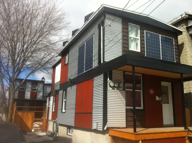 Solar panels on the side of a house